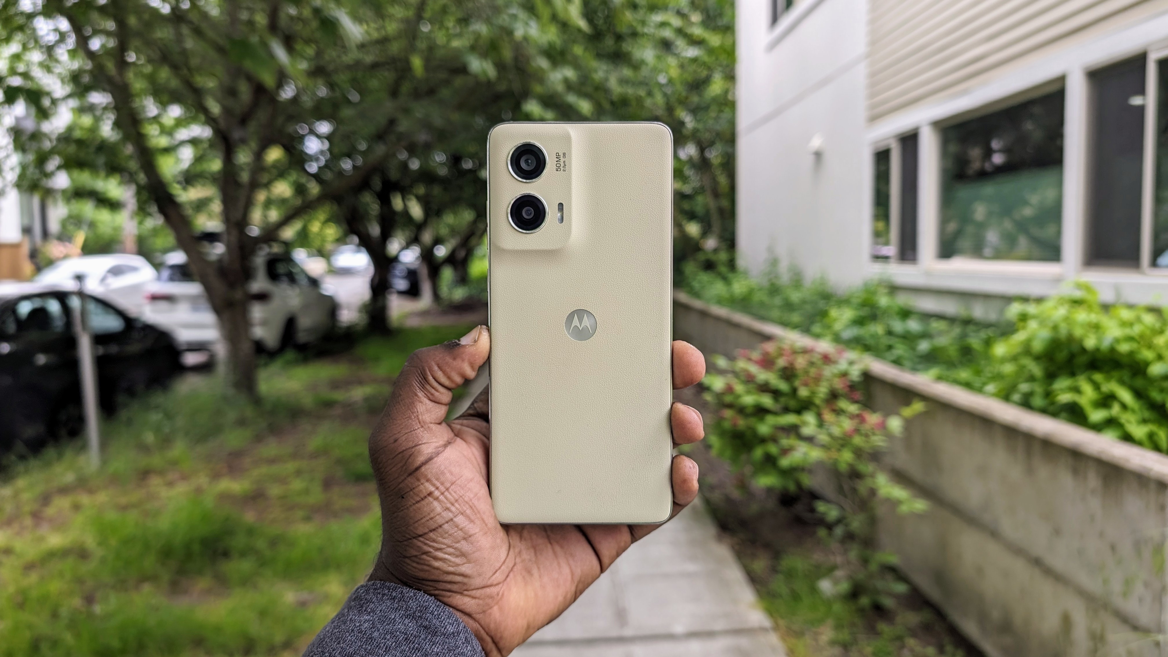 The Moto G Stylus 5G 2024 in hand outdoors