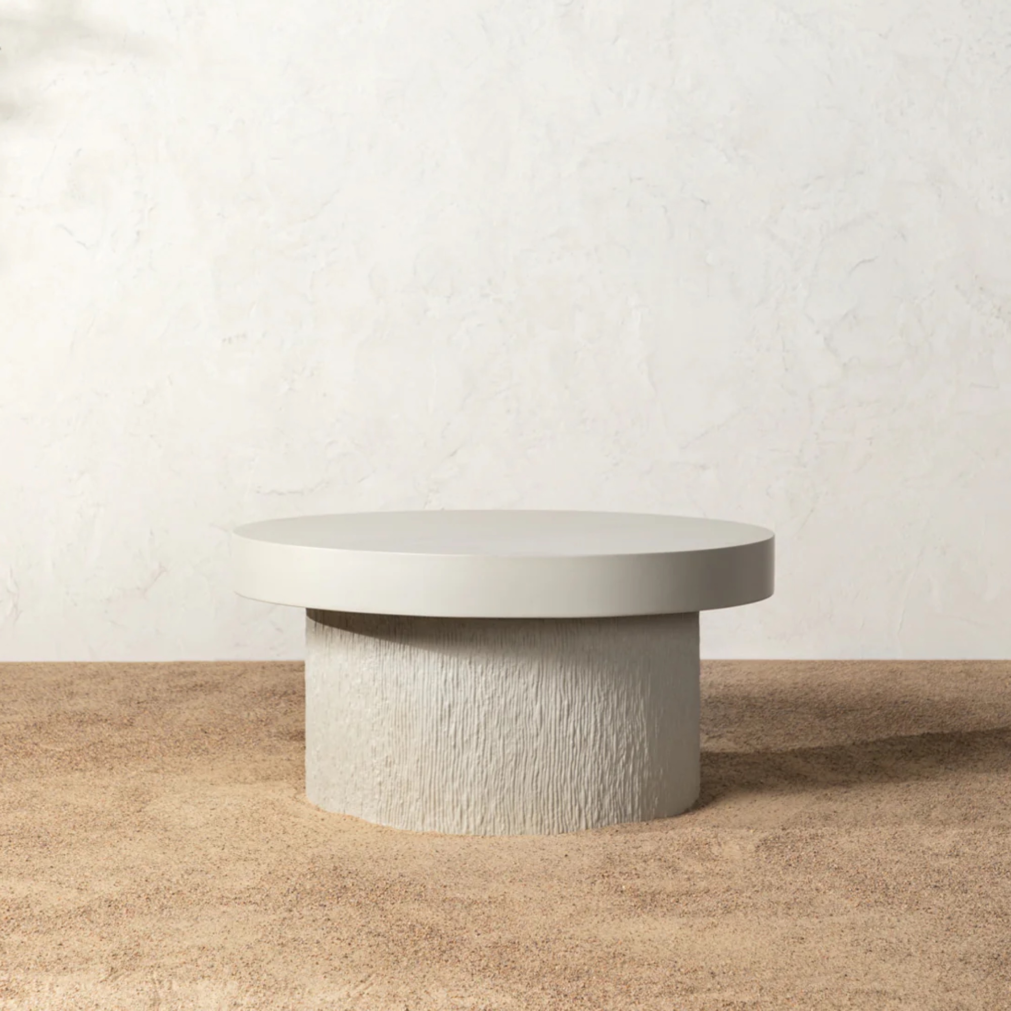 Grey concrete outdoor coffee table by McGee & Co