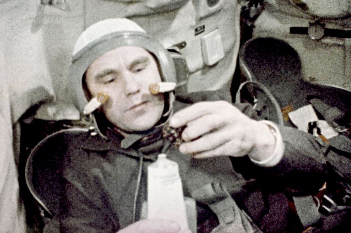 Cosmonaut Vladimir Shatalov aboard Soyuz 4 in January 1969, the first mission to dock two crewed spacecraft.