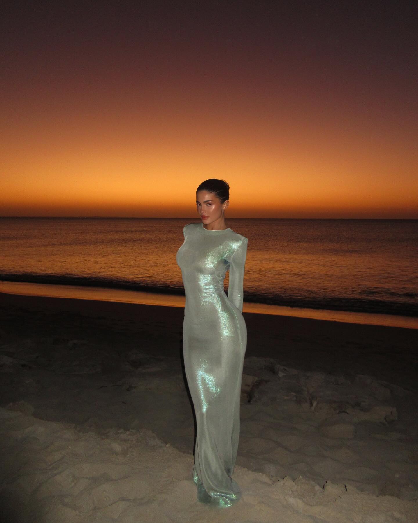 Kylie Jenner Wears Her Shimmery Vacation Dress Like a…