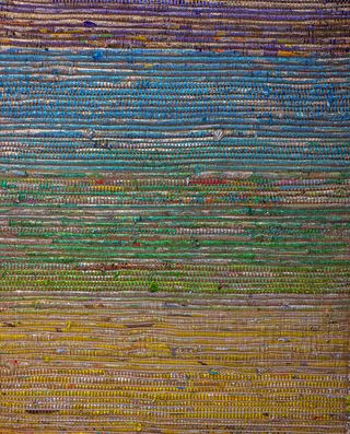 Close up of Tick's colourful tapestry using recycled foil