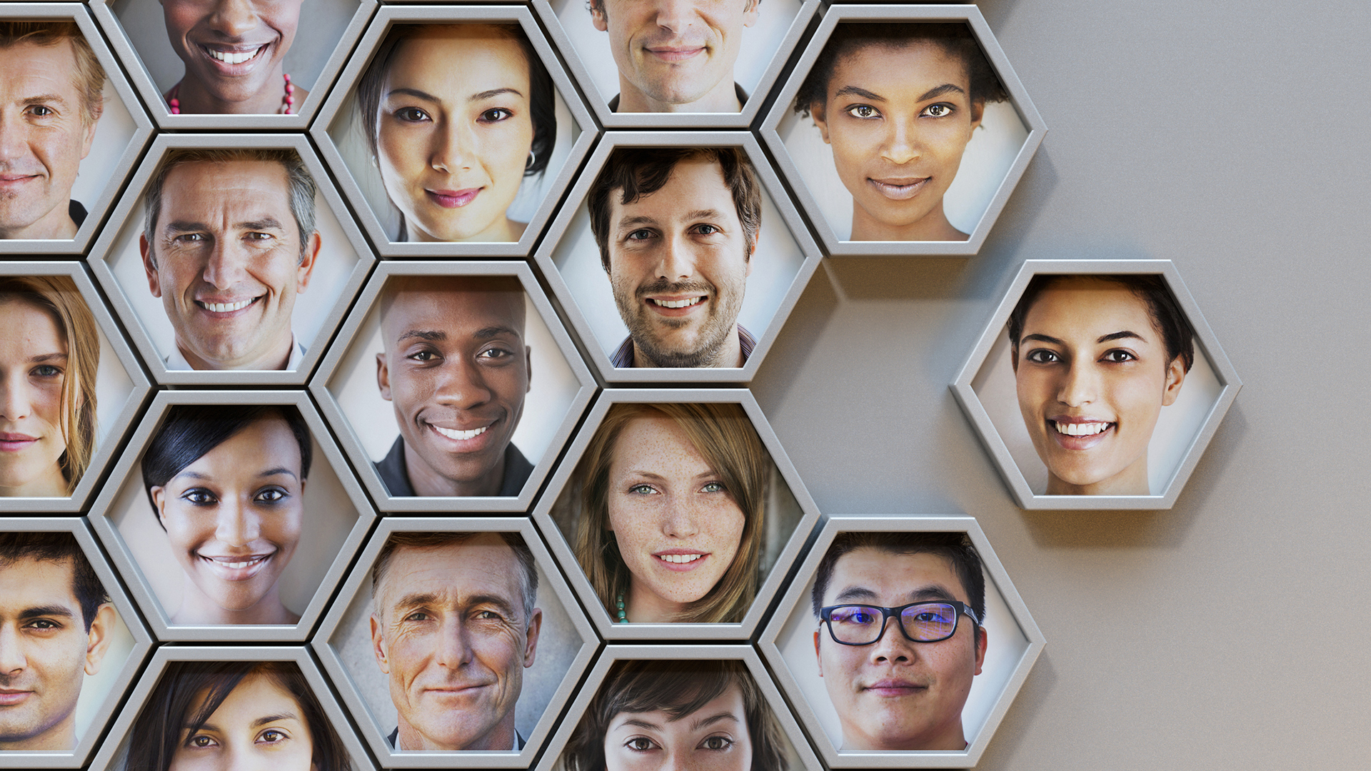 A Group of hexagonal portrait pods with one either slotting in or being pulled out.
