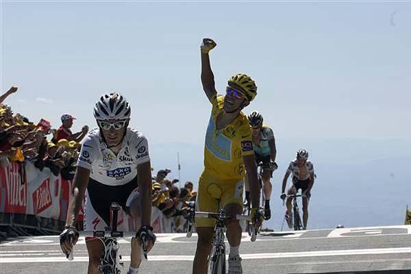 Behind Andy Schleck, Alberto Contador is clearly pleased.