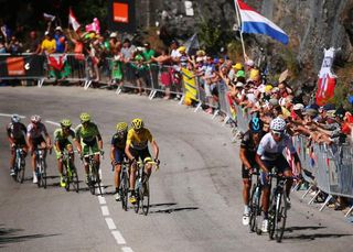 Nairo Quintana jumps way from Chris Froome on Alpe d'Huez and is marked by Richie Porte.