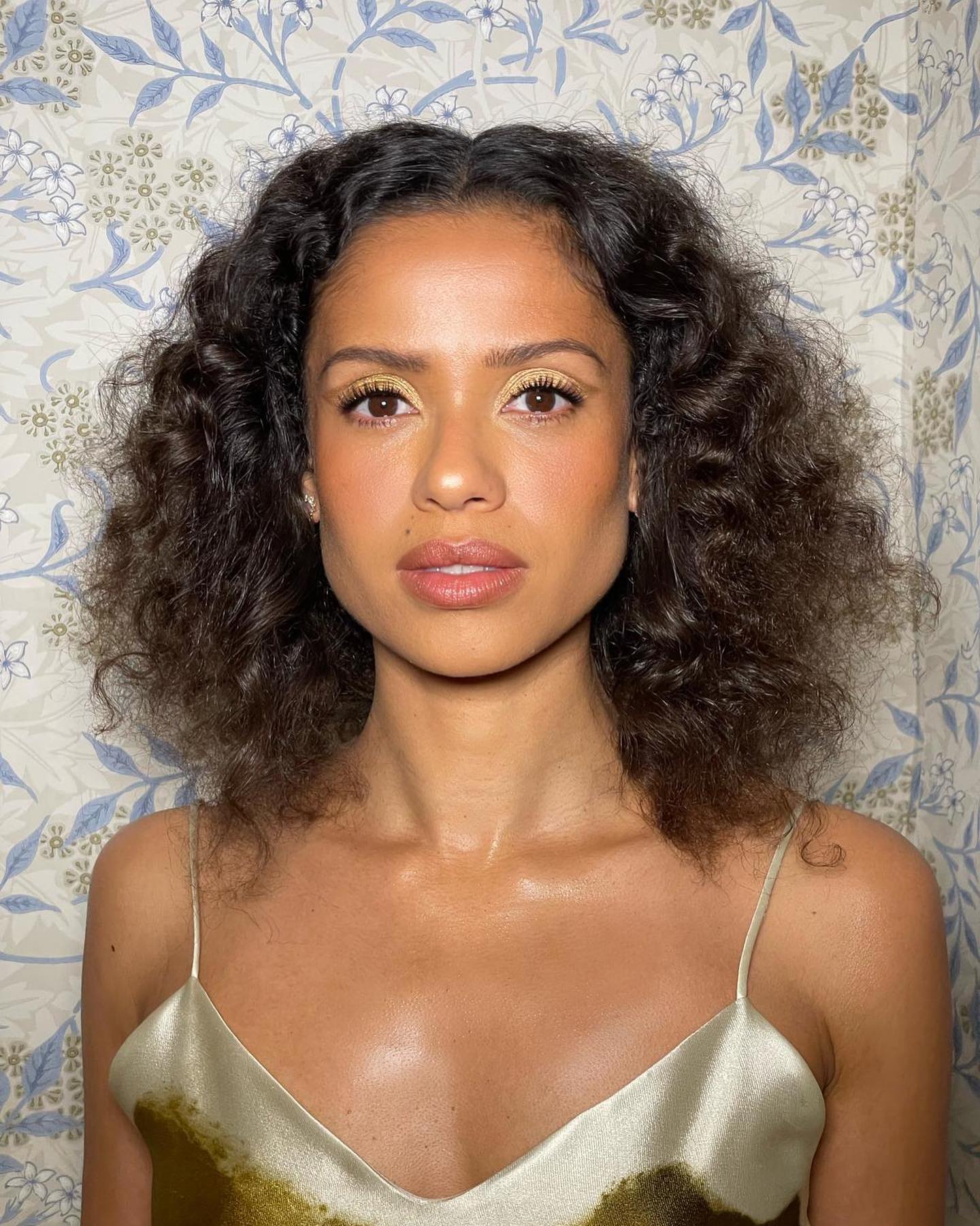 Gugu Mbatha-Raw with long curly bob haircut