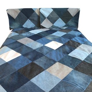 A blue patchwork duvet set with two pillows