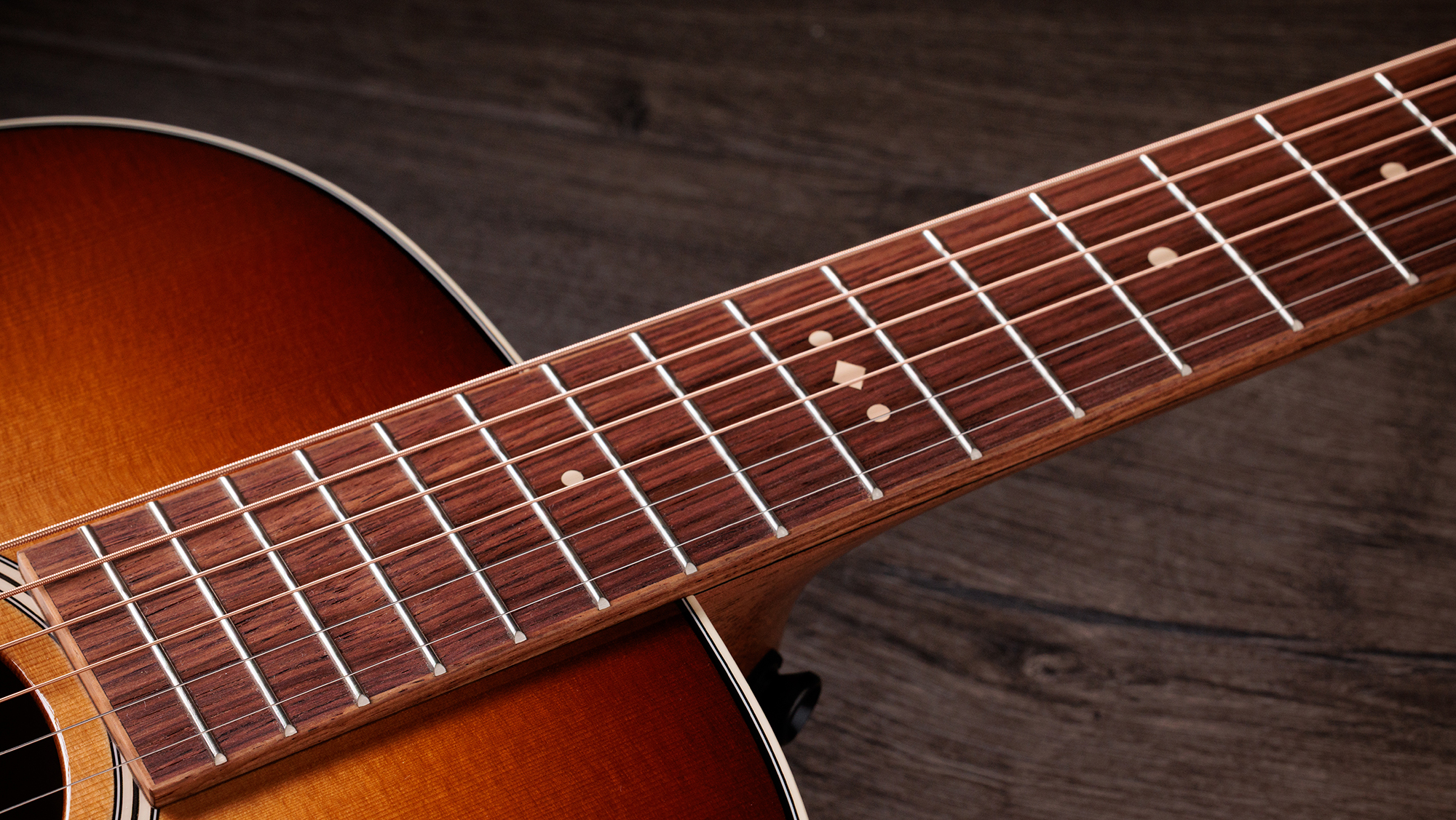 A photo of the Taylor Ben Harper Gold Label 512e Special Edition grand concert acoustic
