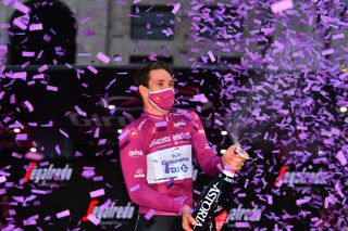 Groupama-FDJ’s Arnaud Démare celebrates winning the cyclamen points jersey in Milan at the finish of the 2020 Giro d’Italia
