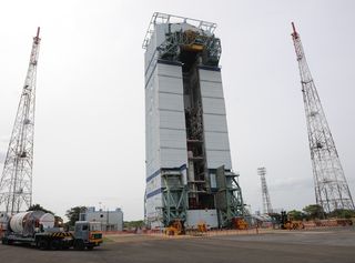 The first stage of the Polar Satellite Launch Vehicle launching India's 100th space mission is assembled for flight in summer 2012.