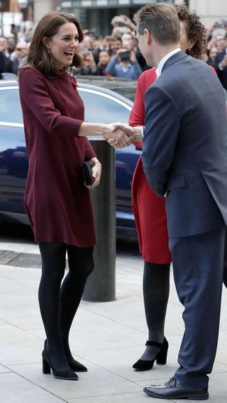 The Princess of Wales smiles as she is greeted by UBS Country Head, David Soanes on her arrival at the annual Place2Be School Leaders Forum