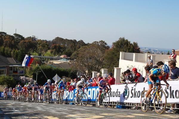 The peloton races up the first climb.