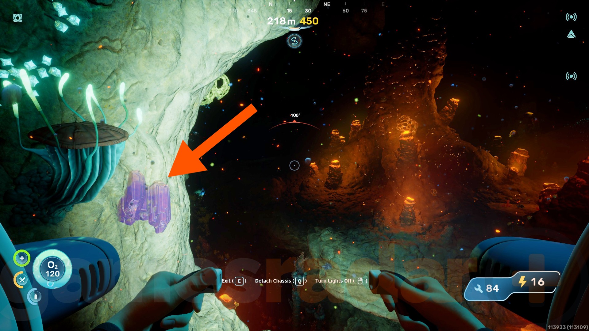A piece of lithium sits on the wall of a cave in Subnautica 2