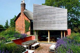 This contemporary extension, designed by Stan Bolt, replaced a poorly conceived 1970s lean-to