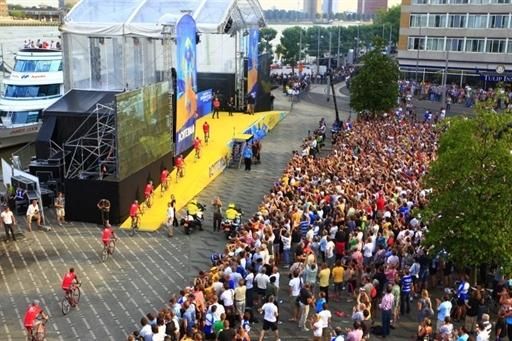 The riders rolled over the pavers and up a ramp to the stage.