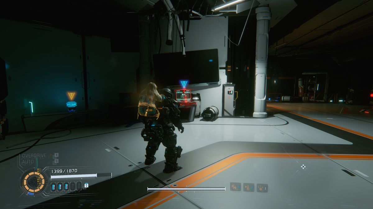 Pragmata Red Zone Gate Keys: A player looking at a Red Gate Key laptop in the Warehouse.