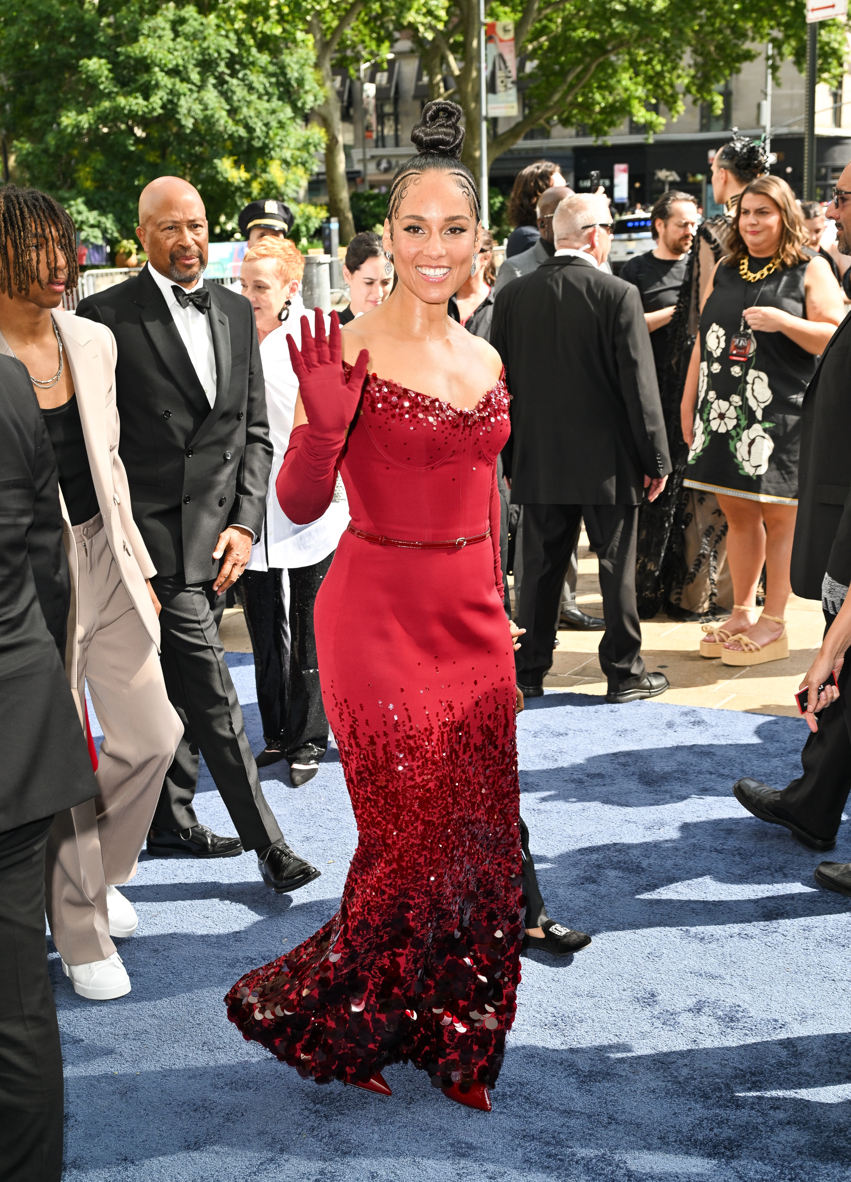 Alicia Keys wearing red dress