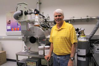 Red Planet researcher Andrew Schuerger, of the Department of Plant Pathology at the University of Florida, makes use of a Mars chamber at NASA's Kennedy Space Center (KSC) in Florida to simulate a variety of Martian environmental conditions.