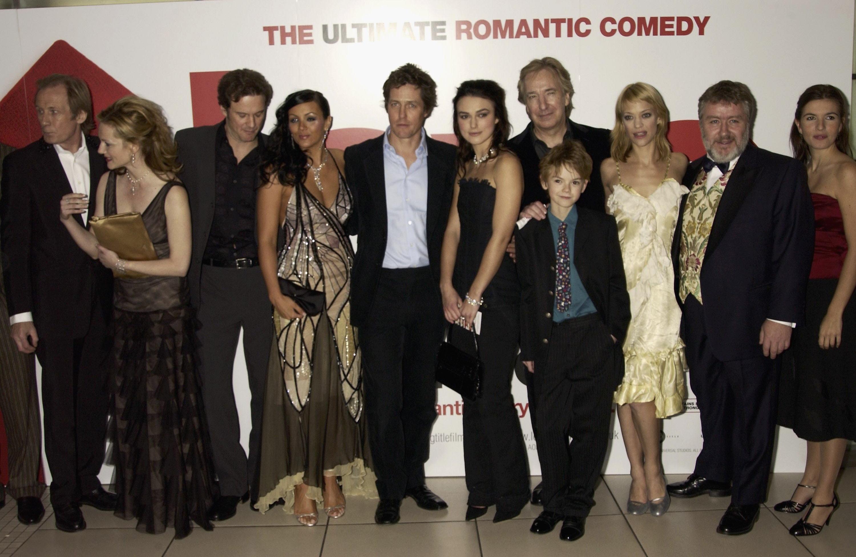 British actresses Martine McCutcheon and Keira Knightley and British actors Hugh Grant, Alan Rickman, and Colin Firth at the UK premiere of the film "Love Actually" held at the Odeon Cinema Leicester Square on November 16, 2003 in London.