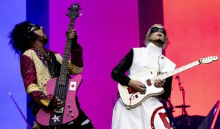 Nikki Sixx (left) and John 5 perform onstage with Mötley Crüe at Marvel Stadium in Melbourne, Australia on November 14, 2023