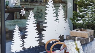 Christmas tree and snowflake window stickers to share Christmas decorating ideas with any passerby