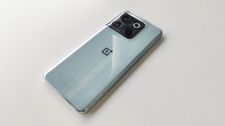 OnePlus 10T review: blue phone lying face down on a table