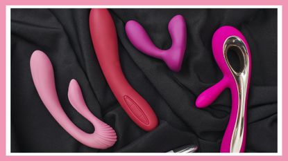 Adult gifts for couples. Close up photo of colorful various sex toys (dildos prostate massager, g-spot vibrators and others) arranged on a black silk fabric.