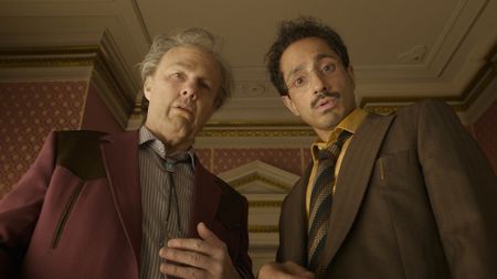 TOM CRUISE as Rockwell and RIZ AHMED as Ganesh in Warner Bros. Pictures and Legendary Pictures&rsquo; &ldquo;DIGGER,&rdquo; a Warner Bros. Pictures release.