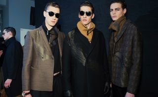 the Emporio Armani show handsome grey and camel coloured knitwear and tailoring.