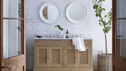 rustic bathroom with statement wooden vanity