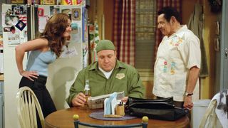 Doug (Kevin James, center) tries to ignore a heated argument between Carrie (Leah Remini) and Arthur (Jerry Stiller, right), when the two discuss why Arthur decided to dye his hair black, on the season finale of The King of Queens, scheduled to air on the CBS Television Network.
