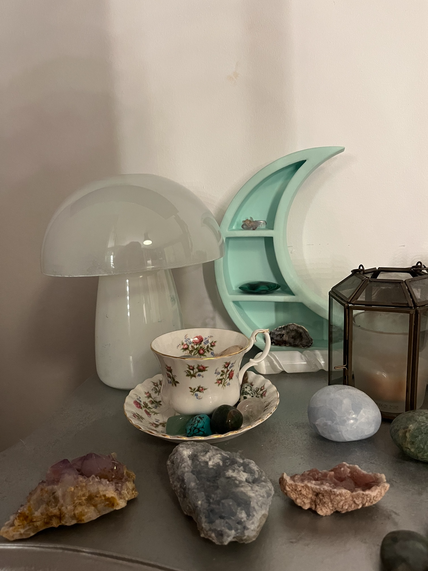 A mushroom lamp on a decorated table