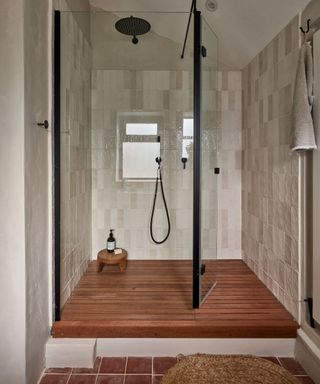 warm color scheme in a modern bathroom by ca pietra