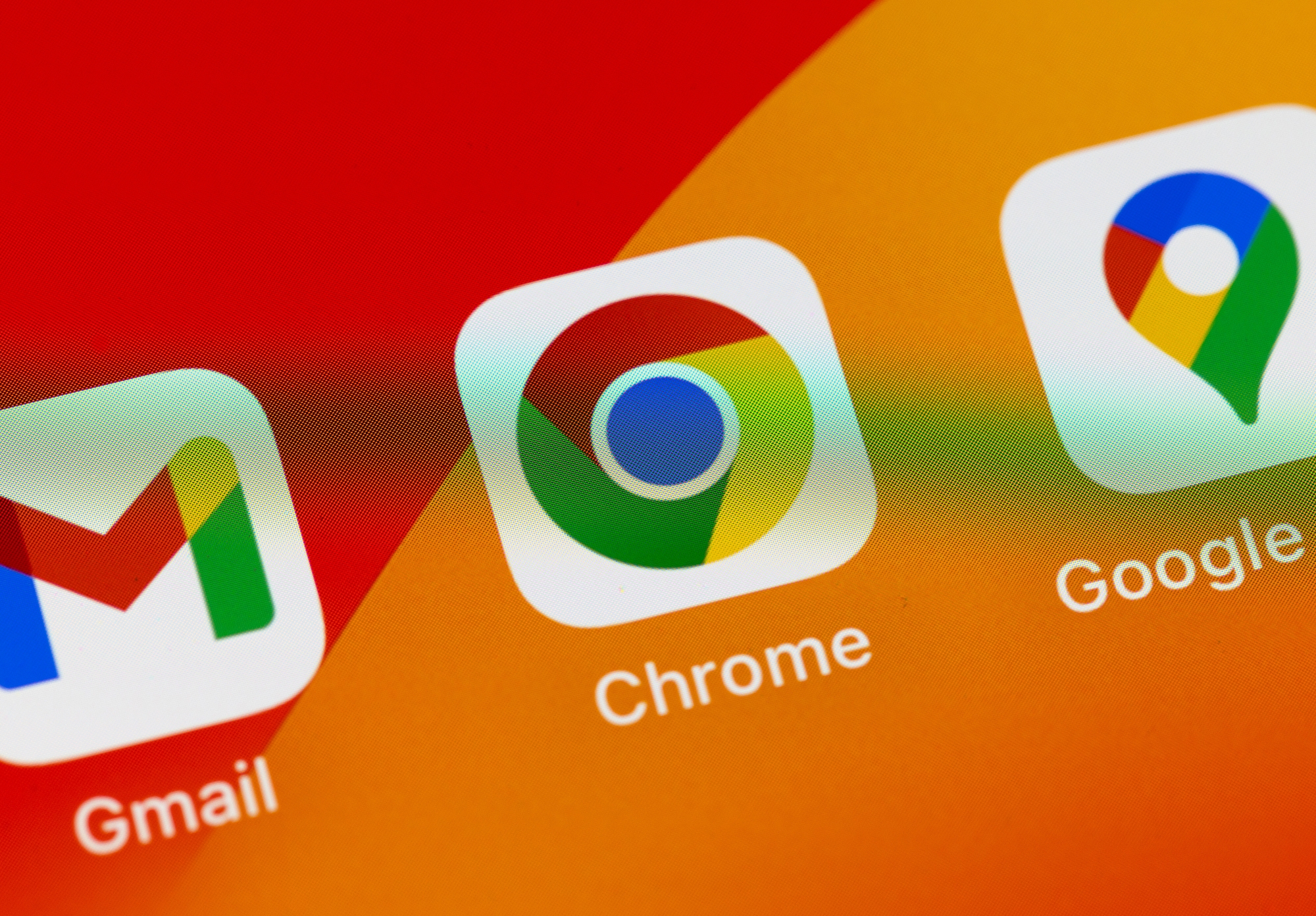 App logos for gmail, chrome and Google maps displayed on a smartphone screen.