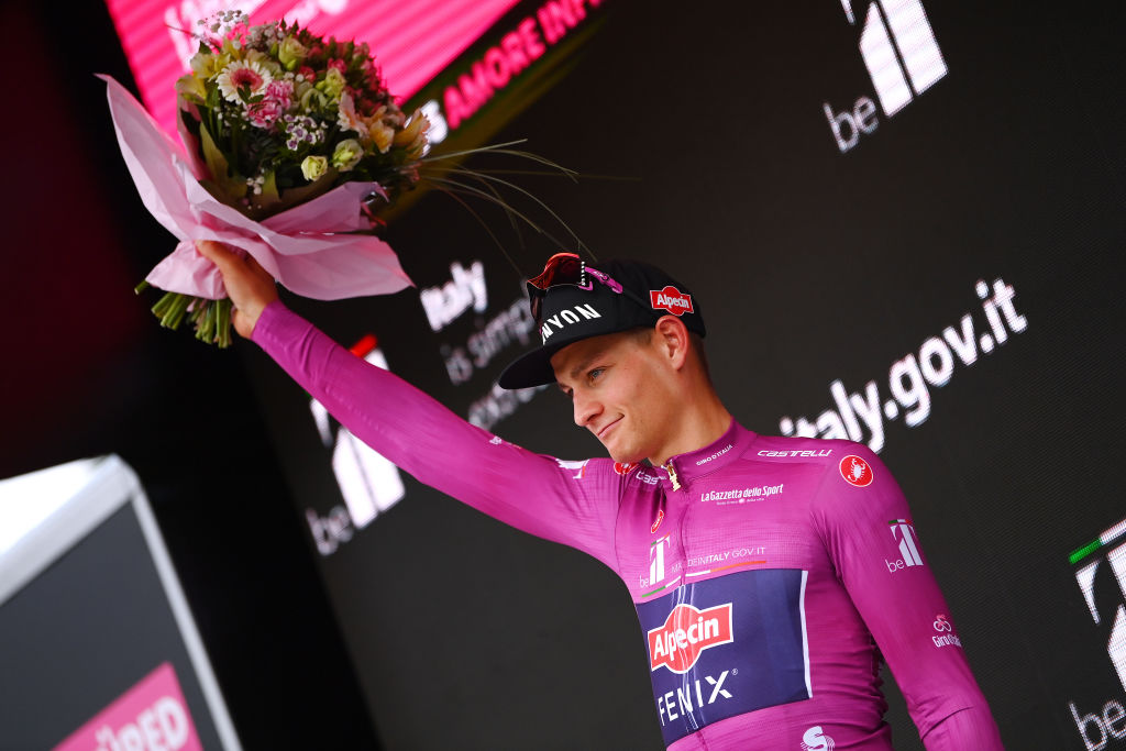 BALATONFURED HUNGARY MAY 08 Mathieu Van Der Poel of Netherlands and Team Alpecin Fenix celebrates winning the purple points jersey on the podium ceremony after the 105th Giro dItalia 2022 Stage 3 a 201km stage from Kaposvr to Balatonfred Giro WorldTour on May 08 2022 in Balatonfured Hungary Photo by Tim de WaeleGetty Images