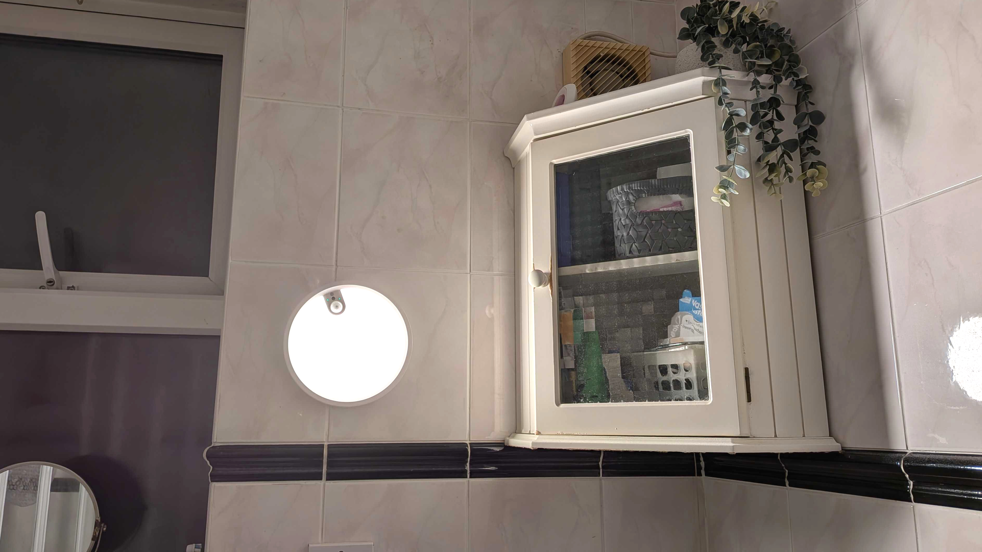 wireless sensor light on bathroom wall
