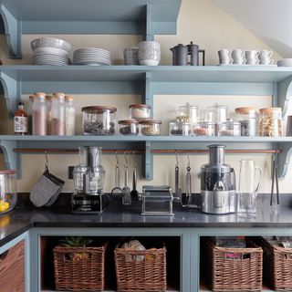kitchen pantry with utensils on kitchen shelves
