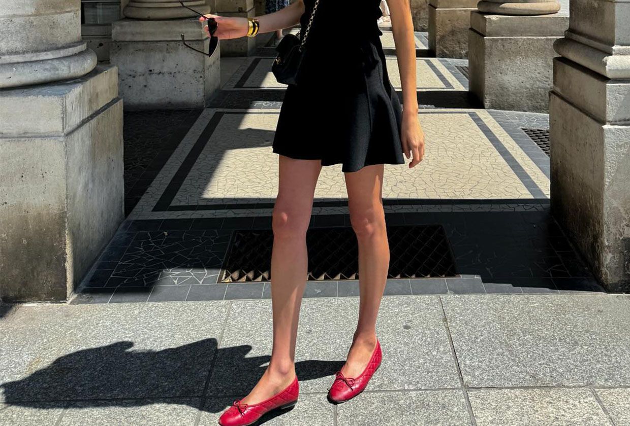 Woman in red ballet flats