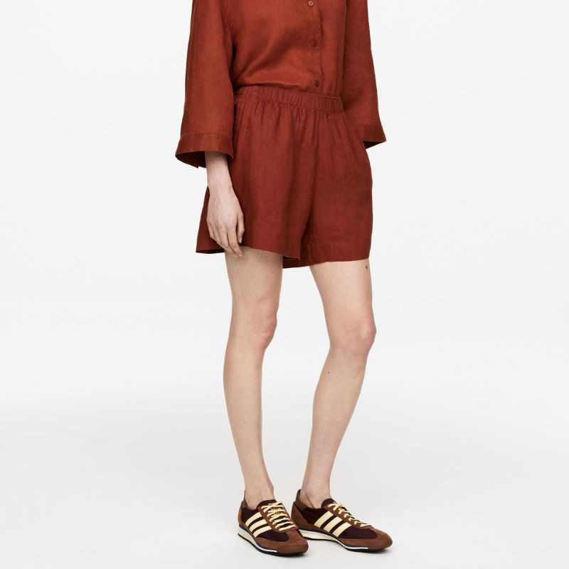 Image of rust coloured linen shorts