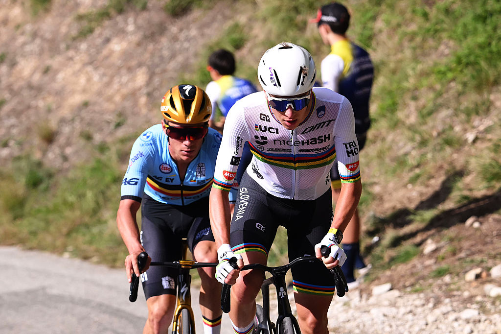 GUILHERAND-GRANGES, FRANCE - OCTOBER 05: Tadej Pogacar and Team Slovenia (R) attacks to Remco Evenepoel and Team Belgium (L) in the breakaway during the 31st UEC Road Cycling European Championships 2025 - Men&amp;apos;s Elite Road Race a 202.5km race from Privas to Guilherand-Granges on October 05, 2025 in Guilherand-Granges, France. (Photo by Bernard Papon - Pool/Getty Images)