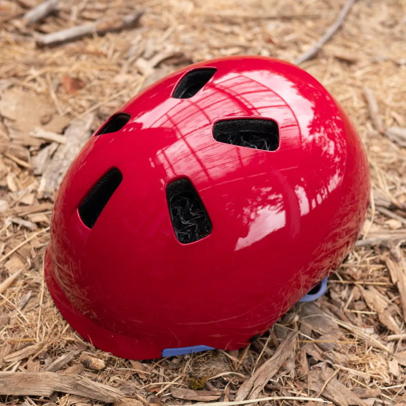 Bontrager Jet WaveCel kids helmet in red on the ground 