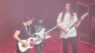 Steve Vai performing with Tim Henson and Scott LePage