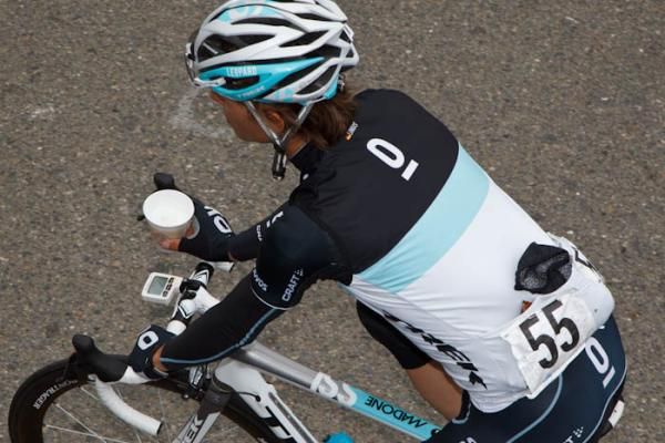 Germany's Linus Gerdemann (Leopard Trek) seems to have picked up on the American habit of drinking coffee on the go.
