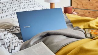 Samsung Galaxy Book on bed