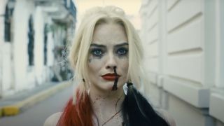 Margot Robbie as Harley Quinn with bloodied nose in The Suicide Squad