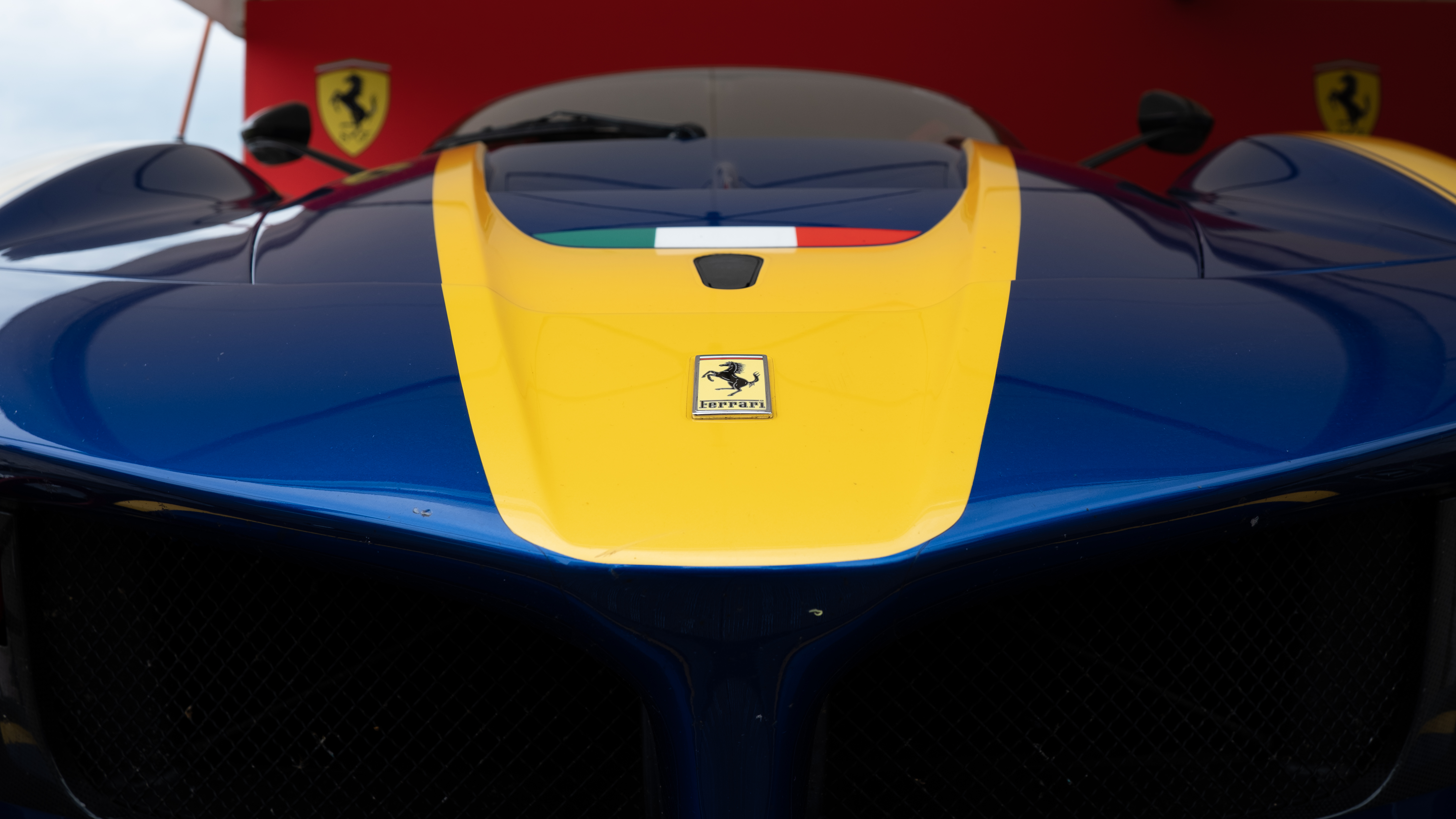 The front of a racing car in the paddocks
