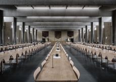 A 2012 photograph of the dining hall at St Catherine’s College, Oxford, UK, with the AJ Oxford table lamp (custom-made by Louis Poulsen) built into the long oak tables. 