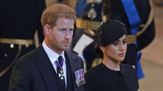 Prince Harry and Meghan Markle attend Queen Elizabeth's funeral in September 2022.