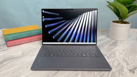 Dell XPS 14 on a desk.