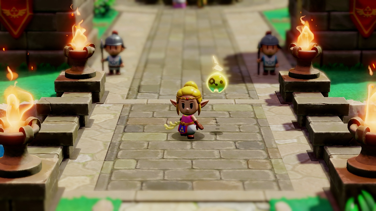 Zelda stands confidently at the entrance of Hyrule Castle, flanked by stone braziers and armored guards.