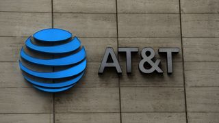 The logo of AT&T outside of AT&T corporate headquarters on March 13, 2020 in Dallas, Texas.